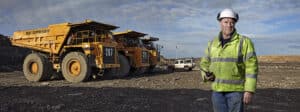 Portrait of foreman with walkie talkie working at quarry